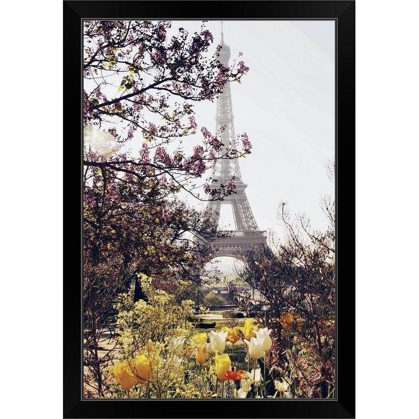 "Springtime in Paris. The Eiffel Tower framed by springtime tulips in yellow and white." Black Framed Print