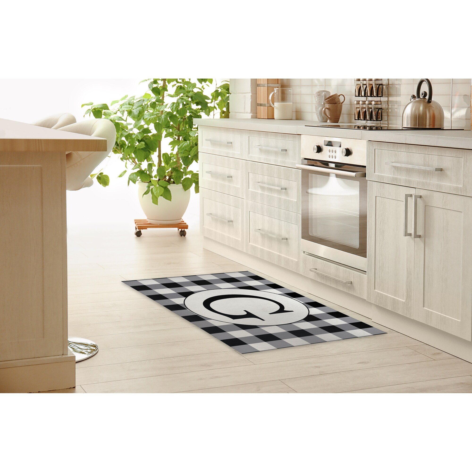 https://ak1.ostkcdn.com/images/products/is/images/direct/d9ce29d3e2abdf71547620c5f340be27f4a45427/MONO-BLACK-%26-WHITE-G-Kitchen-Mat-By-Kavka-Designs.jpg