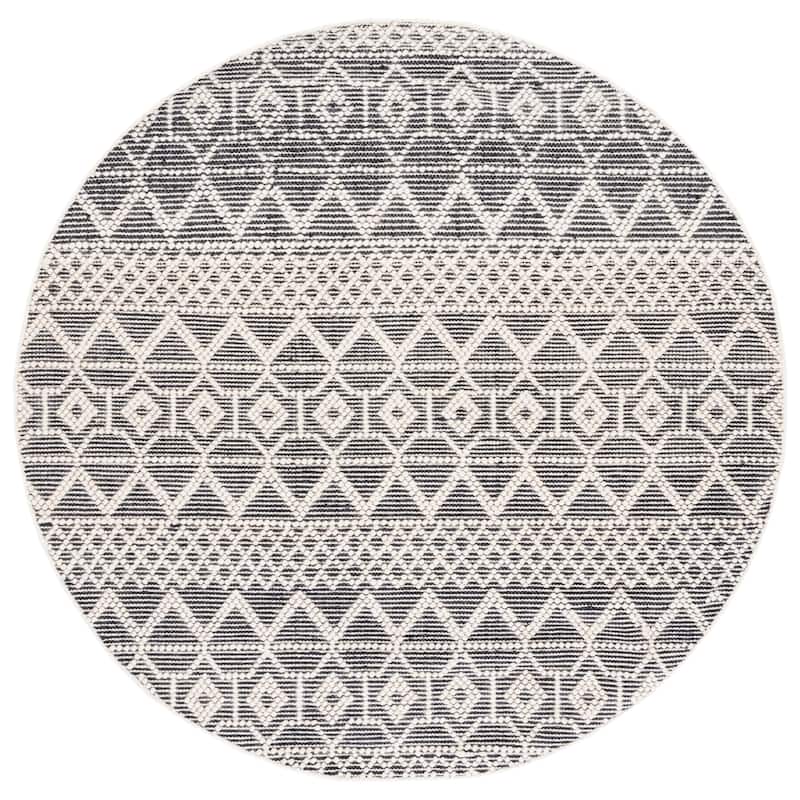 SAFAVIEH Handmade Natura Fehrat Wool Braided Tassel Rug