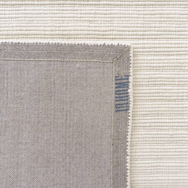 Sevita Solid Casual Hand-Woven Woolen Area Rug