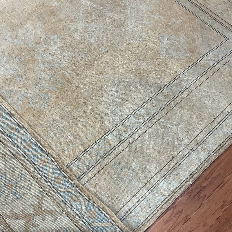 HERAT ORIENTAL Handmade Khotan Wool Rug - 6'9" x 9'7"