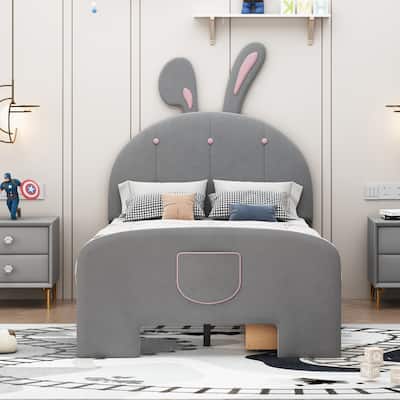 Velvet platform bed with stylized headboard
