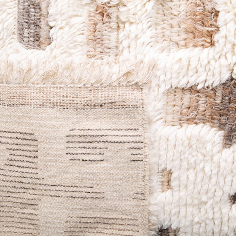 SAFAVIEH Hand-Knotted Manhattan Gunnvor Wool Tassel Rug