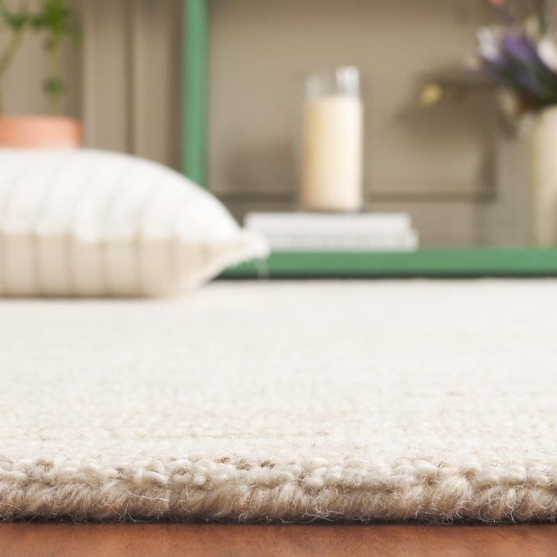 SAFAVIEH Handmade Ebony Peigi Contemporary Wool Rug
