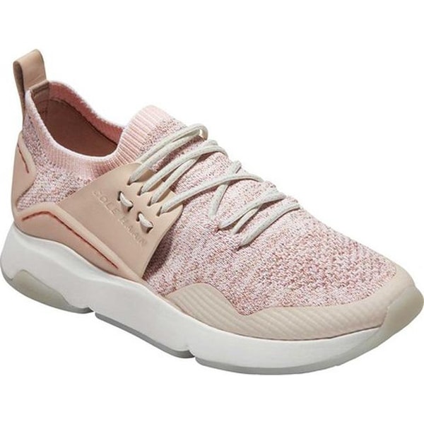 women's white and rose gold trainers
