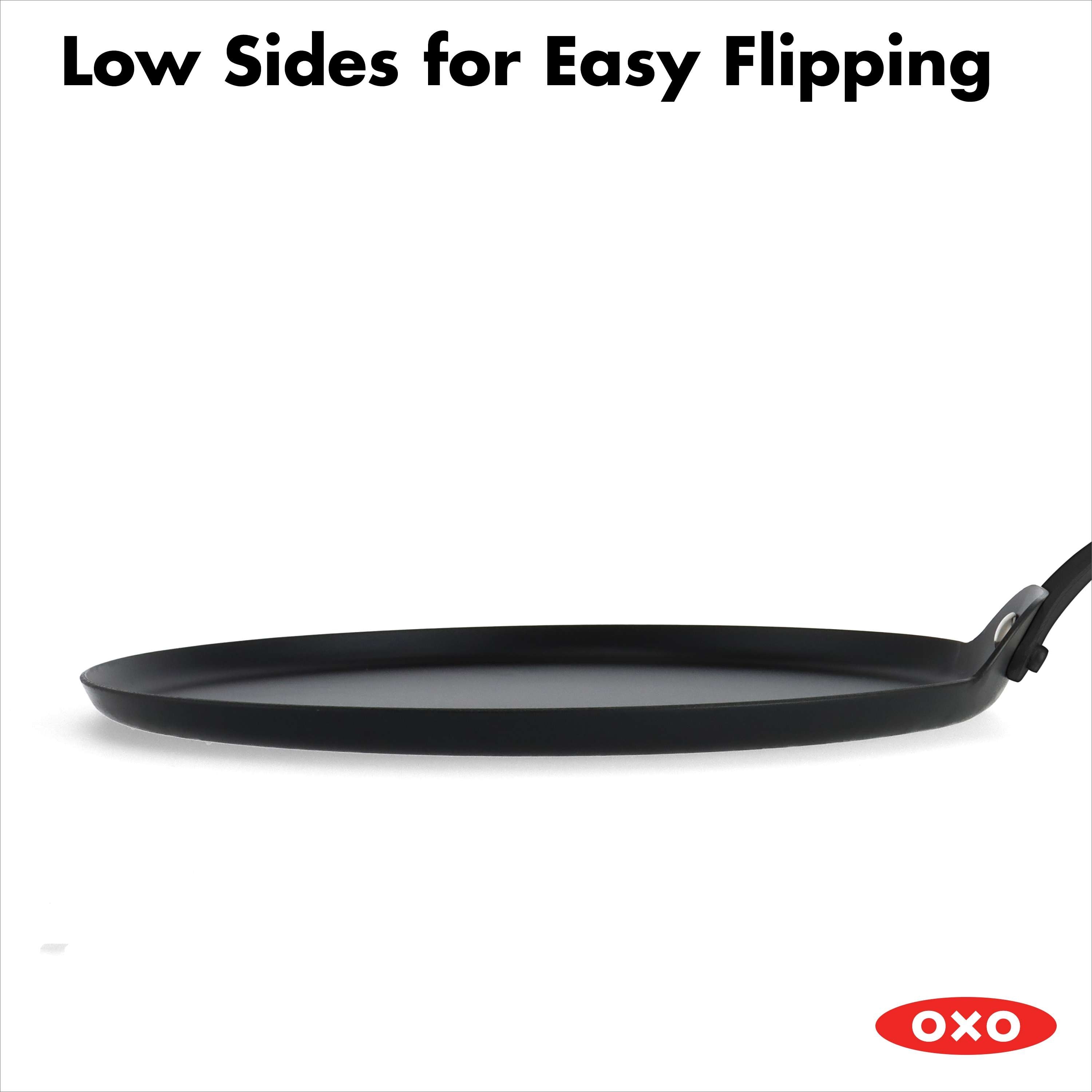 https://ak1.ostkcdn.com/images/products/is/images/direct/da6269fb72118a145896d0b44881bb145e3ff0a8/OXO-Black-Steel-Crepe-Pan-10%22-w--Silicone-Sleeve.jpg