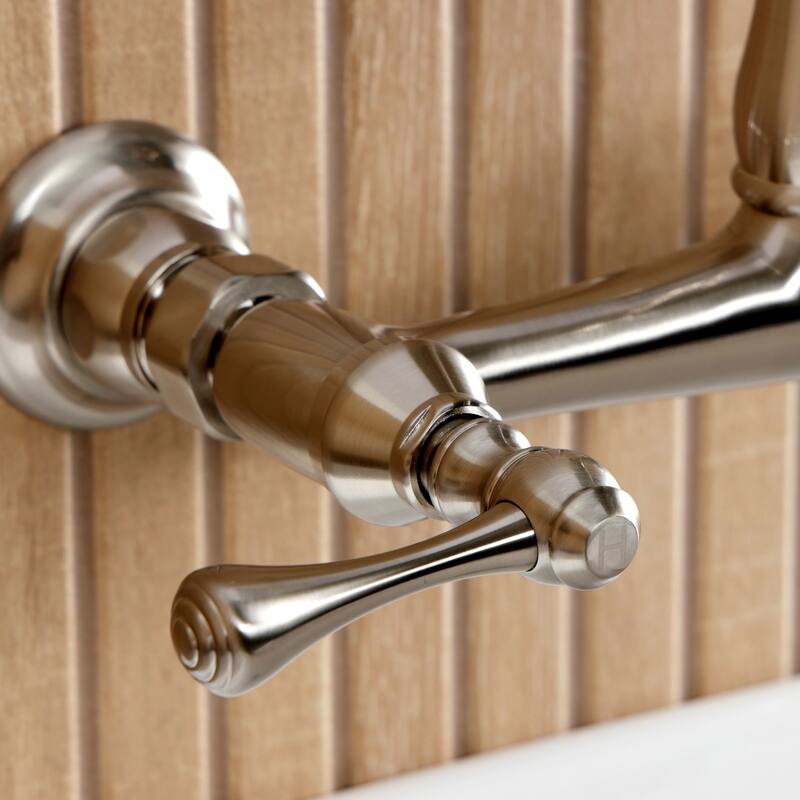 Kingston Brass English Country Two-Handle 2-Hole Wall Mount Bathroom Faucet