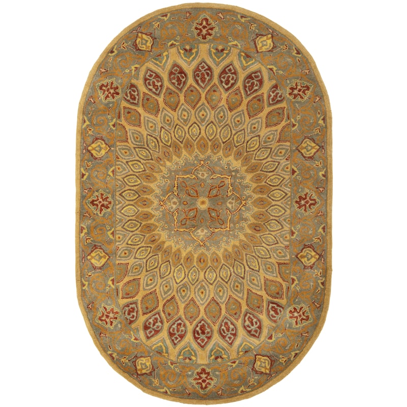 SAFAVIEH Handmade Heritage Wayfarer Traditional Oriental Wool Rug - 4'6" x 6'6" Oval - Light Brown/Grey