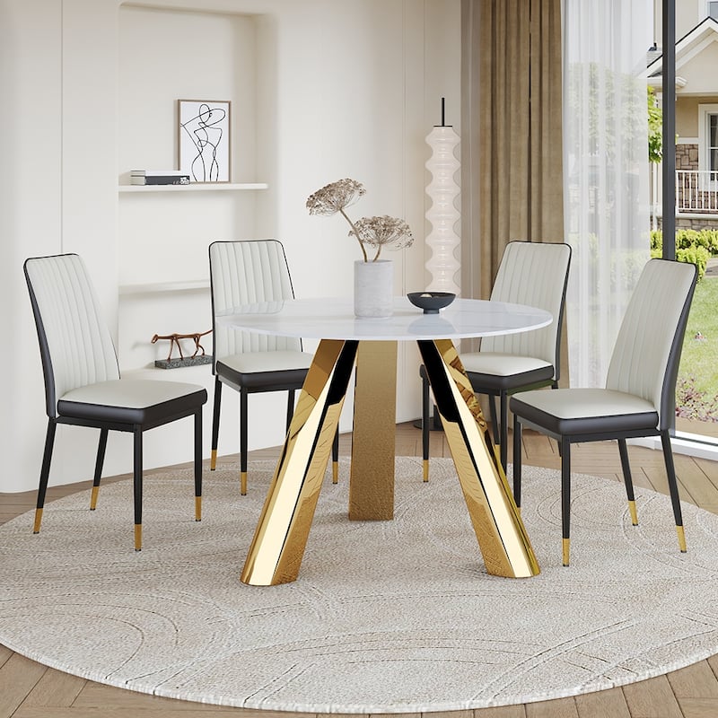 A 42-Inch Round Dining Table With Cast Iron Base And Stainless Steel Legs, Paired With Four White-Gray Striped Dining Chairs