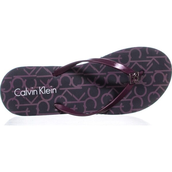 dark purple flip flops
