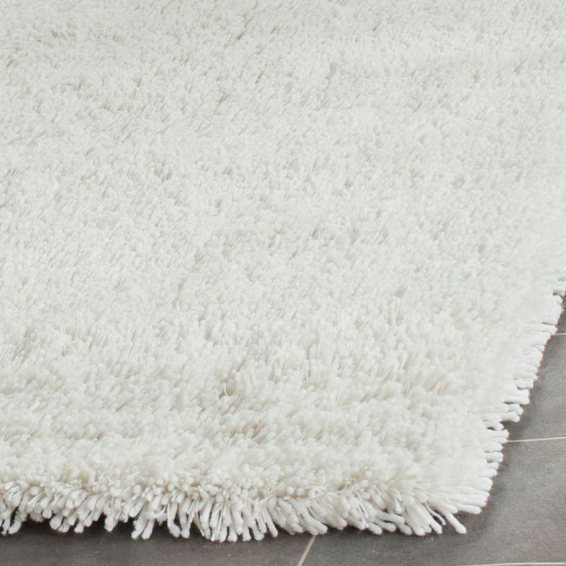 SAFAVIEH Handmade Classic Shag Nakhshun Rug