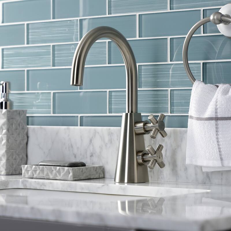 Kingston Brass Constantine Two-Handle 1-Hole Deck Mount Bathroom Faucet with Push Pop-Up