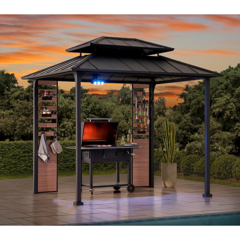 Sunjoy Grill Gazebo 5 ft. x 8 ft. Brown Steel Frame Double Tiered Hardtop Gazebo with Ceiling Hook and Bar Shelves - 7 ft.x 9 ft - Black