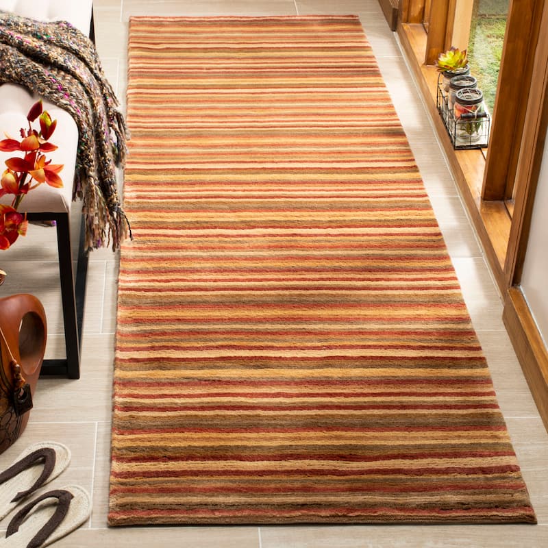SAFAVIEH Couture Hand-knotted Tibetan Soledade Modern Wool Rug with