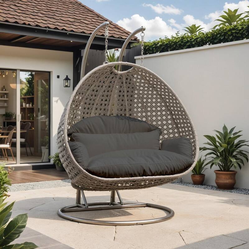LeisureMod Modern 2-Person Egg Hanging Swing Chair with Beige Wicker, Oxford Fabric Cover, Patio Hammock Lounger and Cushions