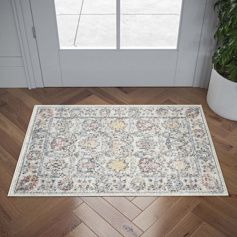 Addalyn Oriental Border Area Rug