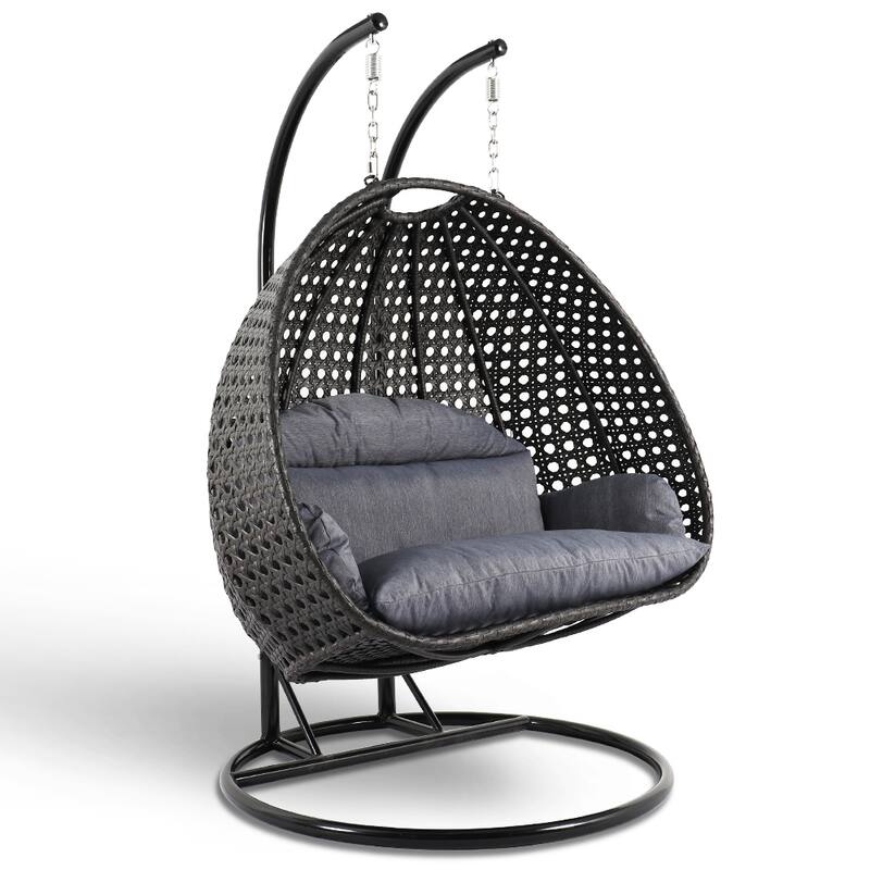 LeisureMod 2-Person Hanging Egg Swing Chair with Metal Stand - Handcrafted Charcoal Wicker, Patio Hammock Lounger with Cushions - Charcoal Blue