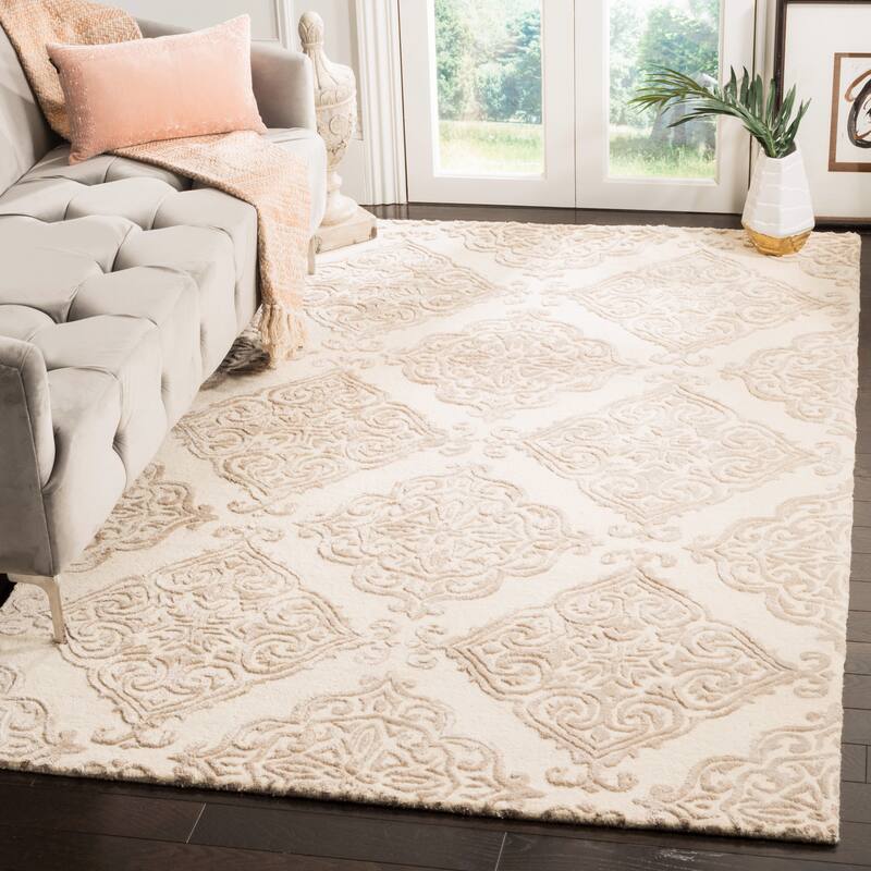 SAFAVIEH Handmade Glamour Graca Modern Viscose Rug - 5' x 8' - Ivory/Beige