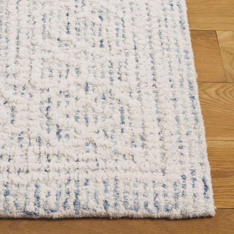 SAFAVIEH Handmade Ebony Vellamo Wool Rug