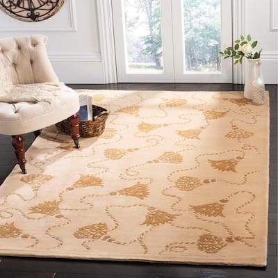 SAFAVIEH Couture Hand-knotted Tibetan Pierpaola Modern Wool Rug