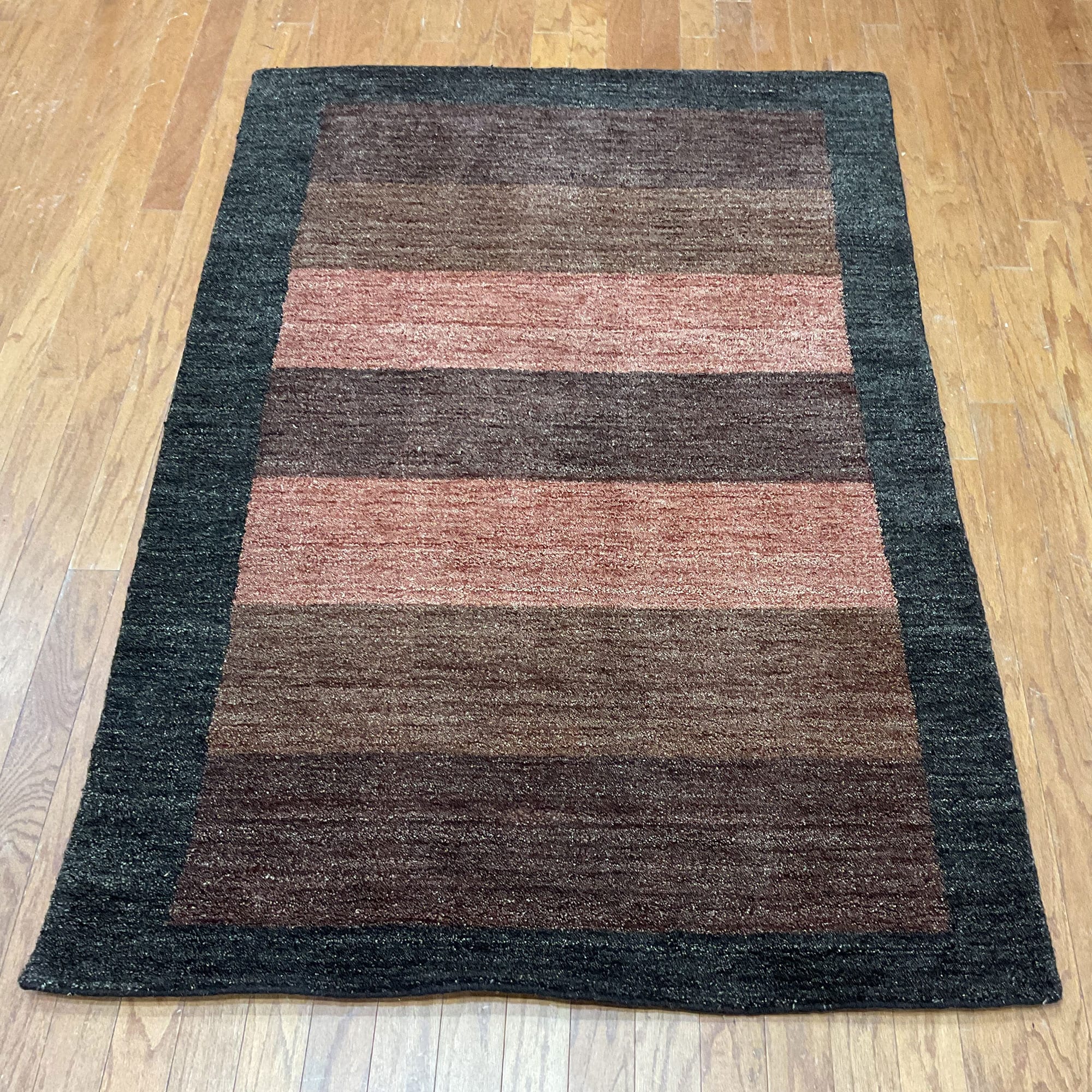 HERAT ORIENTAL Handmade 4' x 6' Dark Border Tibetan Wool Rug - 4' x 6'