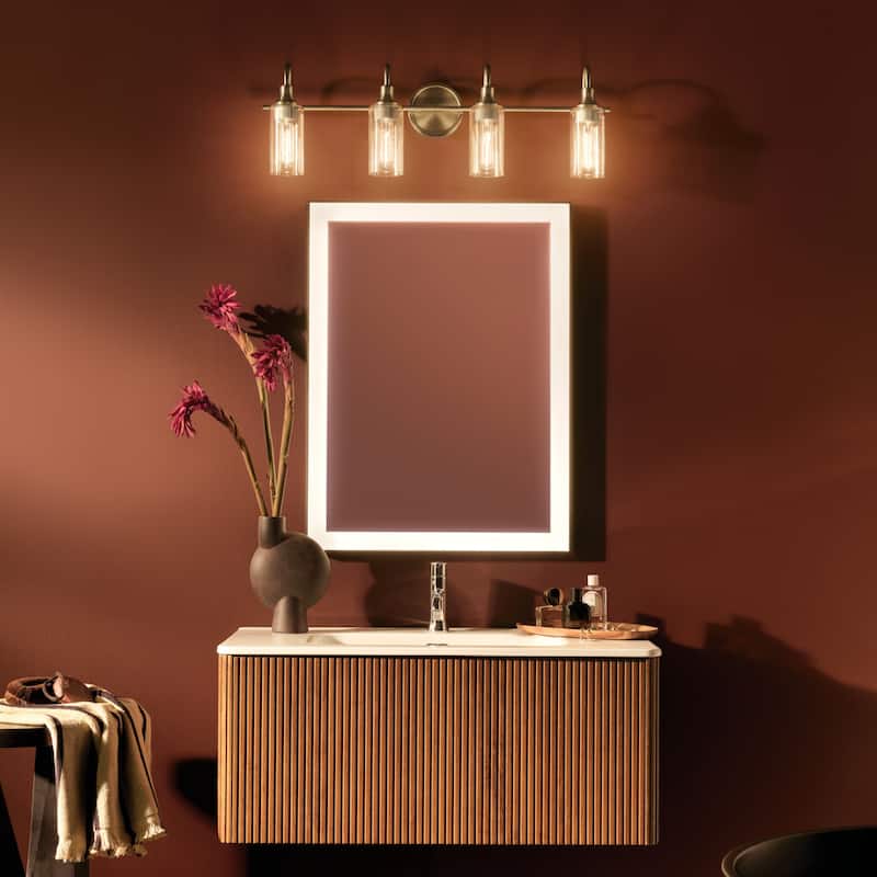 Kichler Lighting Kavi 31.5" 4-Light Vanity Light with Clear Glass in Champagne Bronze