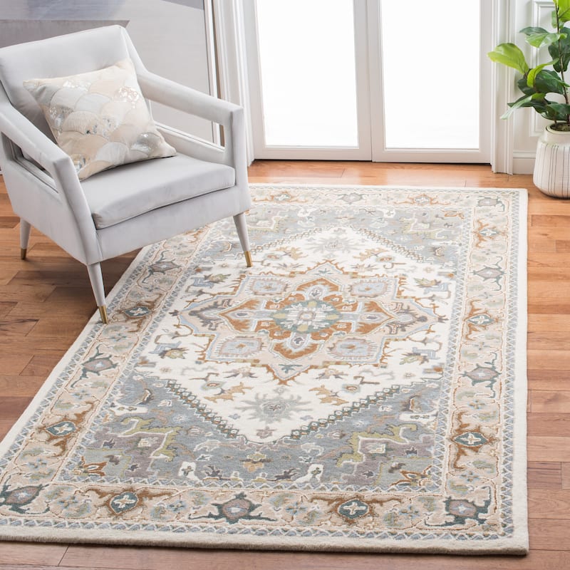 SAFAVIEH Handmade Heritage Asia Traditional Oriental Wool Rug - 6' x 9' - Ivory/Light Blue