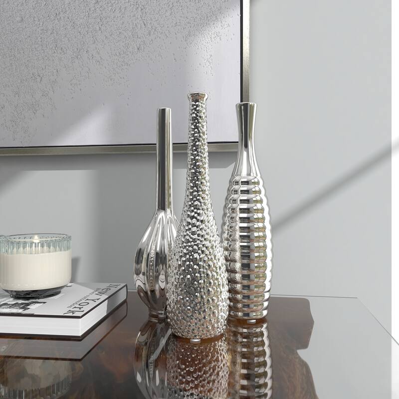 CosmoLiving by Cosmopolitan Sleek Ceramic Glam Vase with Varying Patterns (Set of 3) - Silver, Gold, Dark Blue, White