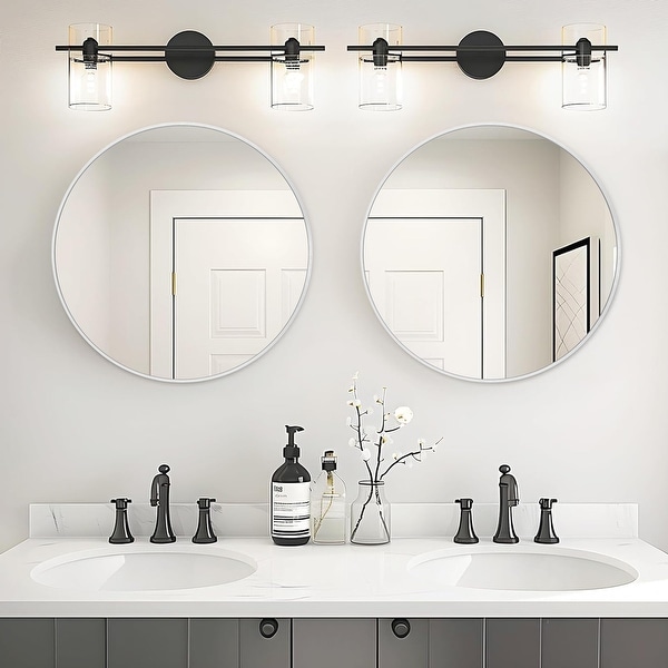 Round mirror with wall sconces top