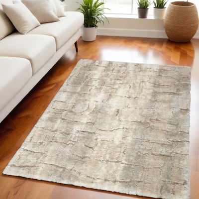 Power Loomed Abstract Stain Resistant Soft Area Rug - 87' X '63' X '1.58