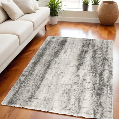 Javug Power Loomed Abstract Modern Stain Resistant Soft Area Rug By HomeRoots - 87' X '63' X '1.58
