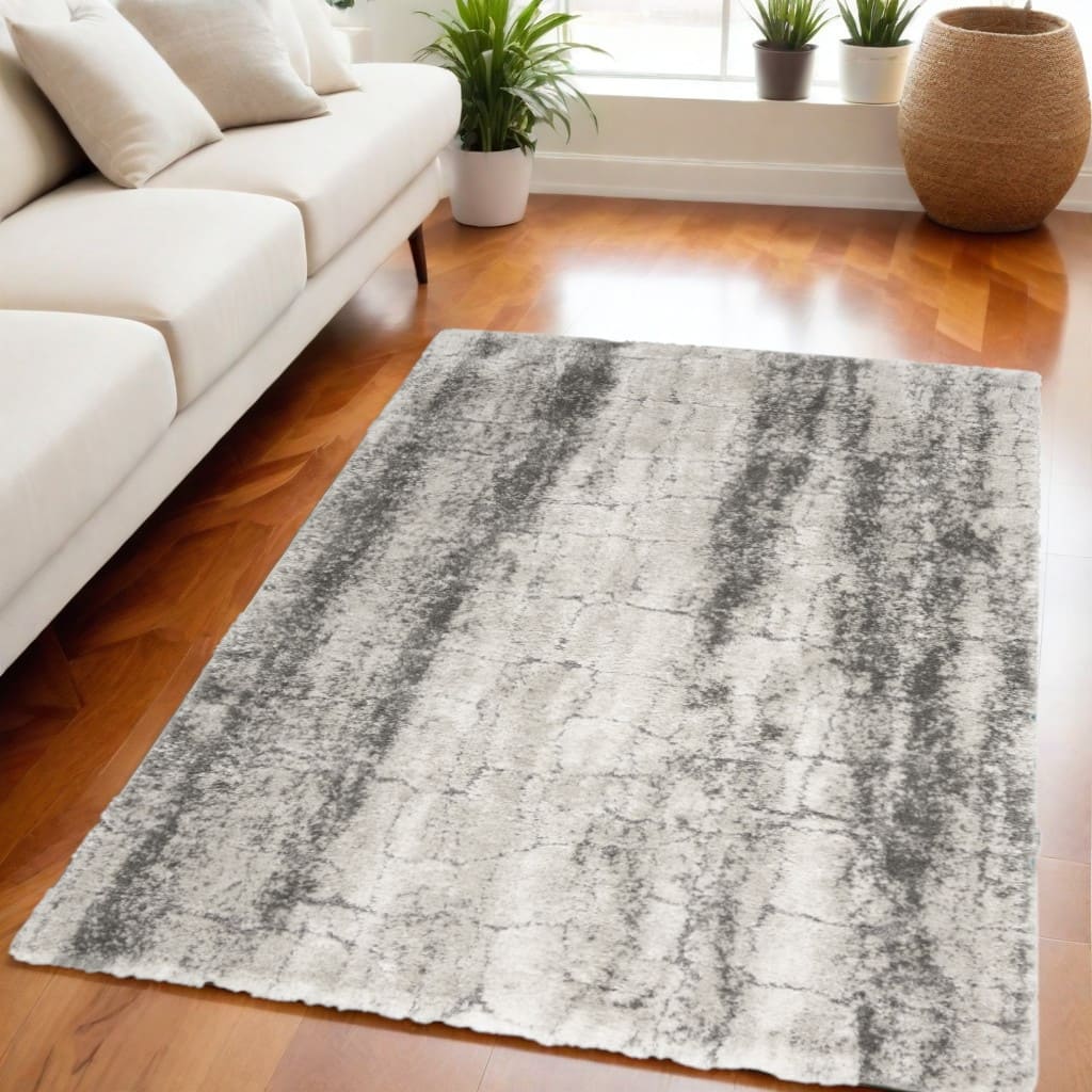 Javug Power Loomed Abstract Modern Stain Resistant Soft Area Rug By HomeRoots - 87' X '63' X '1.58