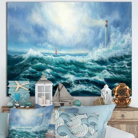 Designart "Lighthouse In Middle Of Blue Wild Ocean Waves" Nautical & Coastal Canvas Wall Art Print