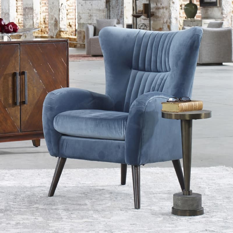 21.75" bronzed metal cylindrical accent table on a gray concrete base