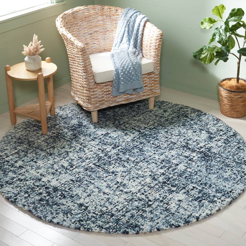 SAFAVIEH Handmade Abstract Euphrasie Modern Wool Rug - 6' Round - Black/Ivory