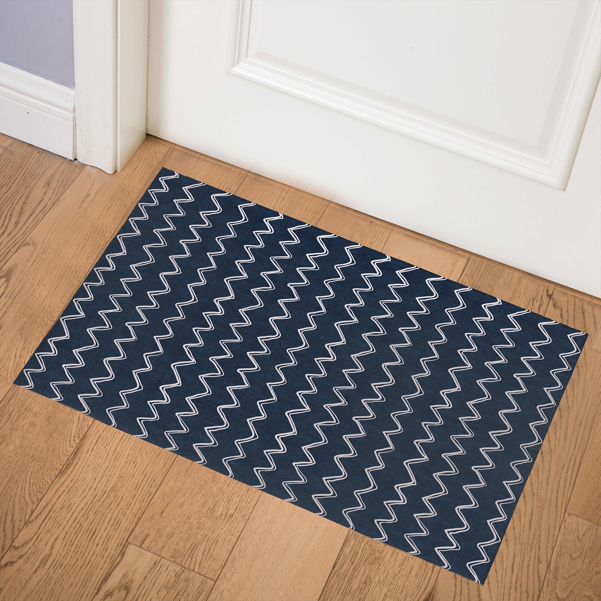 https://ak1.ostkcdn.com/images/products/is/images/direct/dc7ff69acff3695367efbeed8a3fe7d7fe767b79/MOROCCAN-HORIZONTAL-STRIPE-NAVY-Indoor-Floor-Mat-By-Becky-Bailey.jpg