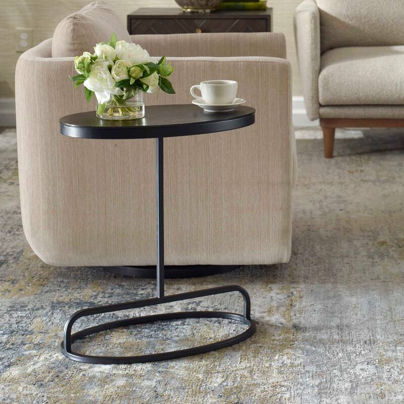 Strick & Bolton Aged Black Aluminum Oval Accent Table