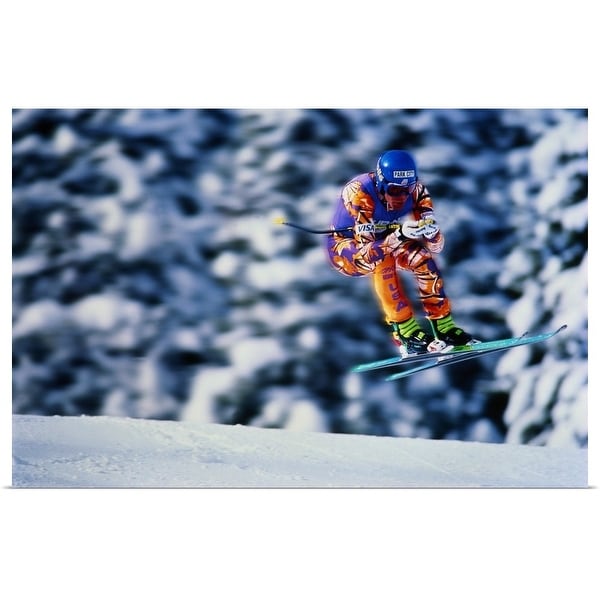 "Skiing, Downhill event, competitor jumping over ridge, trees behind" Poster Print