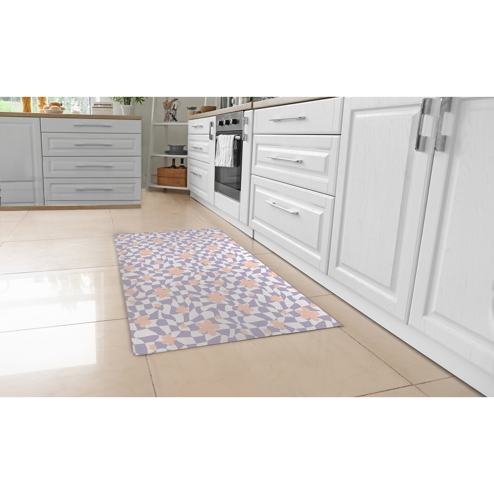 https://ak1.ostkcdn.com/images/products/is/images/direct/dcafa6d3d68fea81b164becd26f0a9ed0924aa66/WARPED-CHECKERBOARD-FLOWER-WHITE-LILAC-Kitchen-Mat-By-Becca-Garrison.jpg