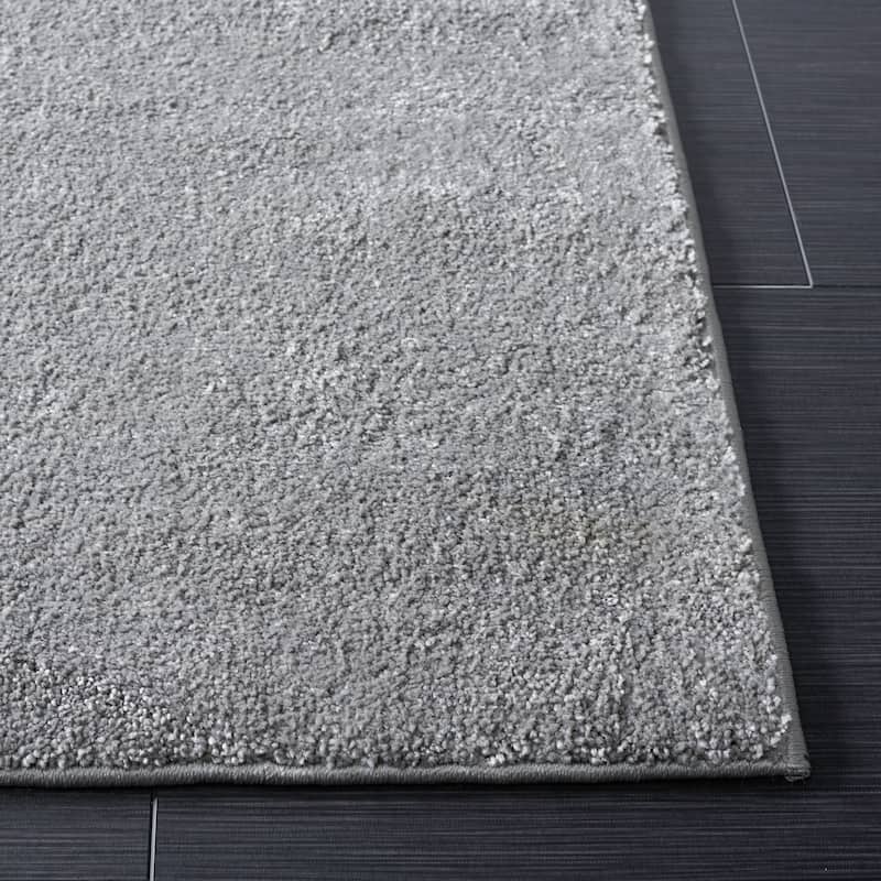 SAFAVIEH, Nonskid Gunde Solid Rug