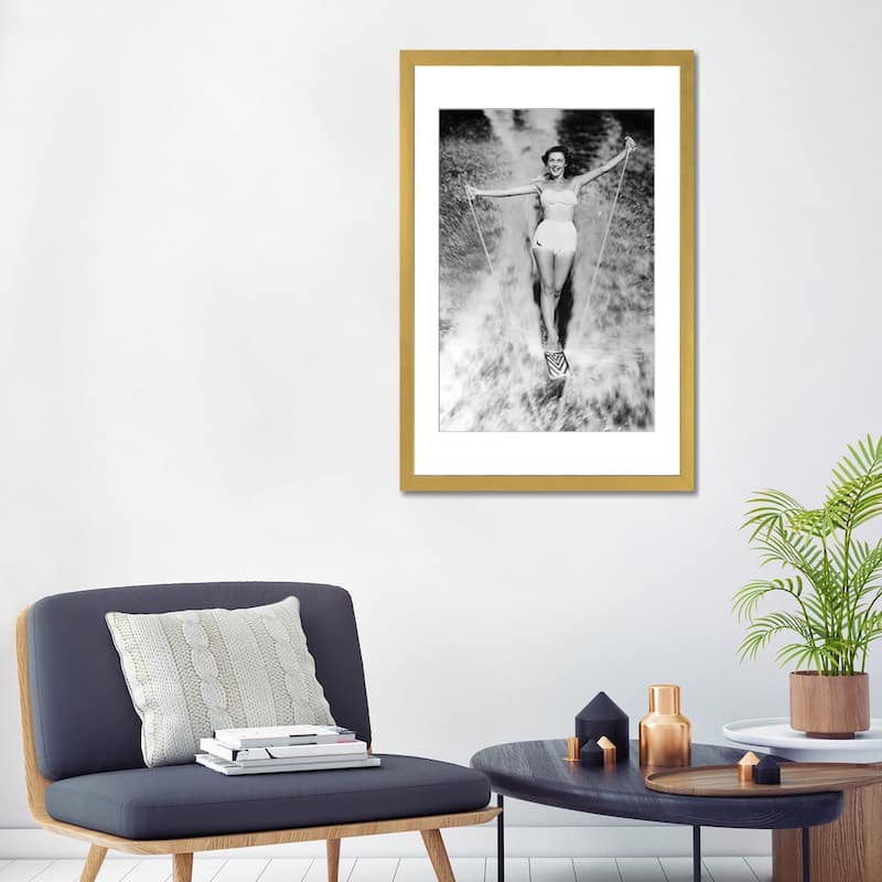 iCanvas "1950s Smiling Woman In White Two Piece Bathing Suit Aquaplaning Water Skiing Looking At Camera" by Vintage Images