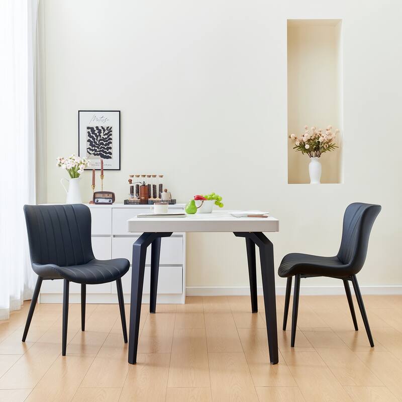 Pair of Cream White Mid-Century Modern Dining Chairs with Faux Leather Upholstery‌