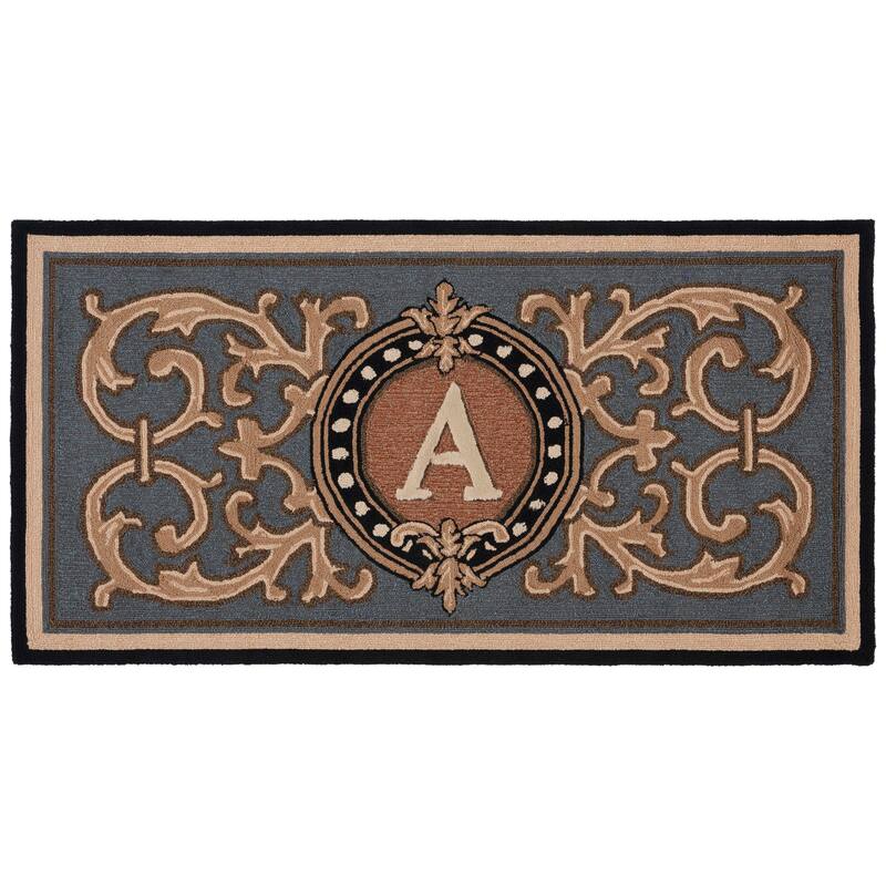 SAFAVIEH Handmade Monogram Irmengard Casual Rug