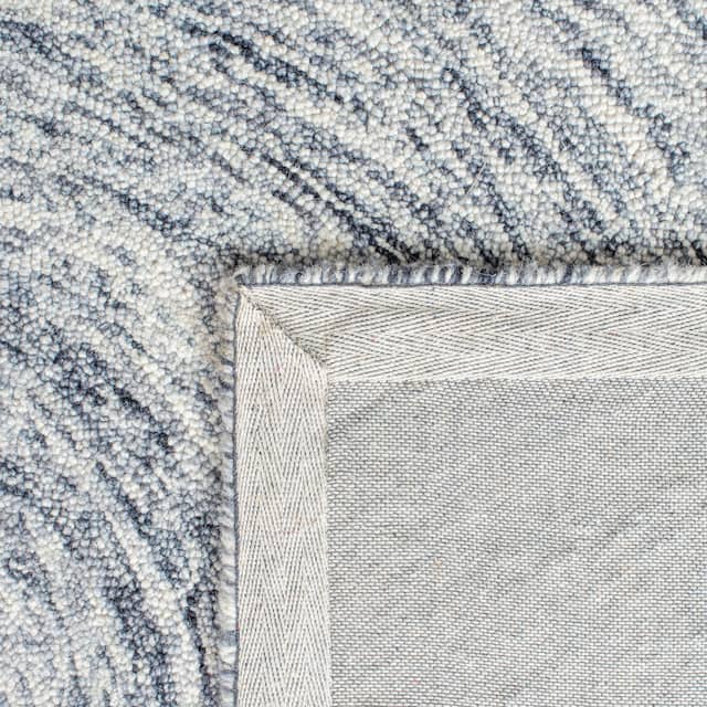 SAFAVIEH Handmade Ikat Jaycie Wool Rug