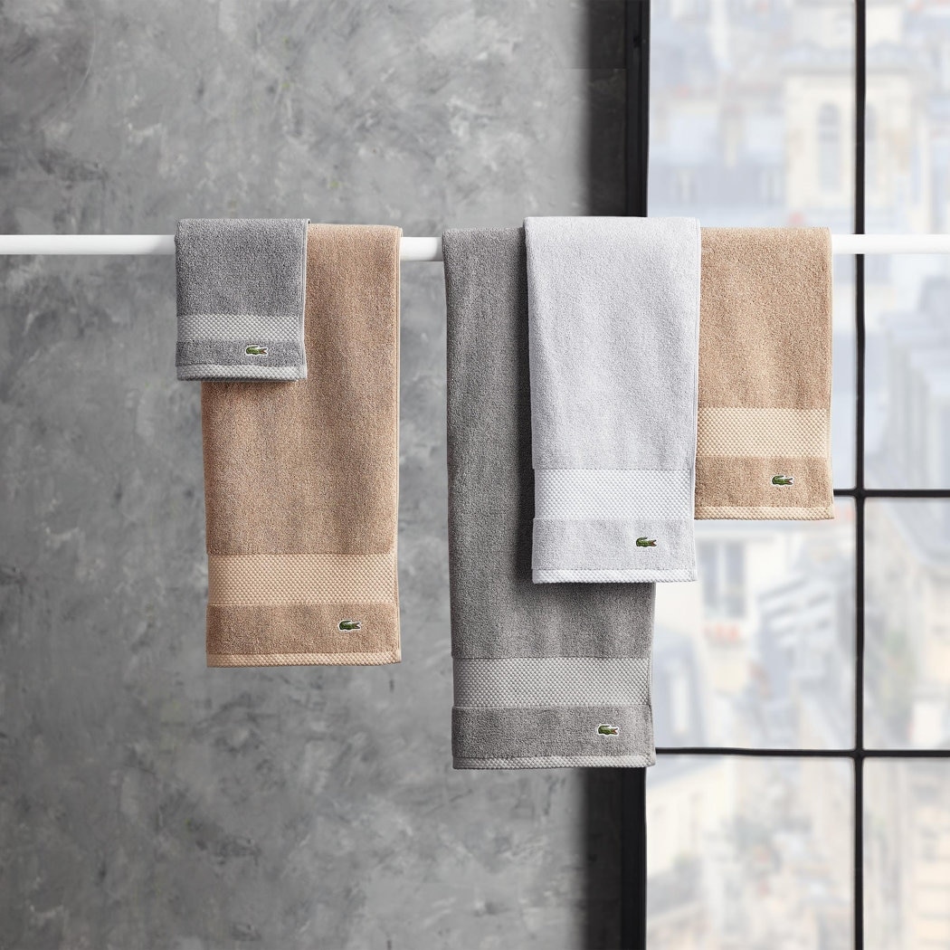 https://ak1.ostkcdn.com/images/products/is/images/direct/dd4b942f65ca462e52dfb34d28970dc42e491a2b/Lacoste-100%25-Cotton-Hand-Towel.jpg