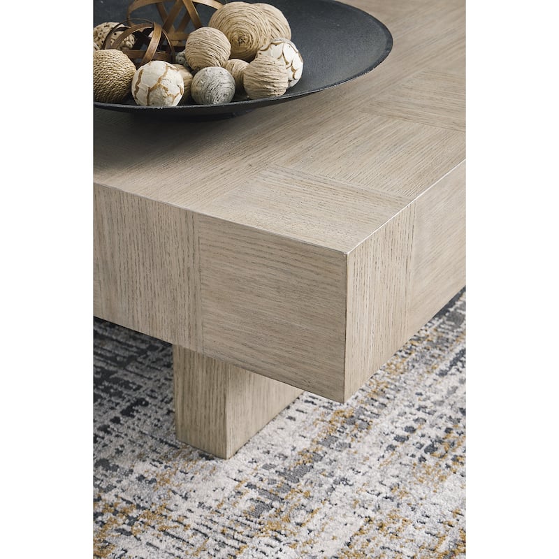 Signature Design by Ashley Jorlaina Light Grayish Brown Coffee Table - 60"W x 35"D x 16"H