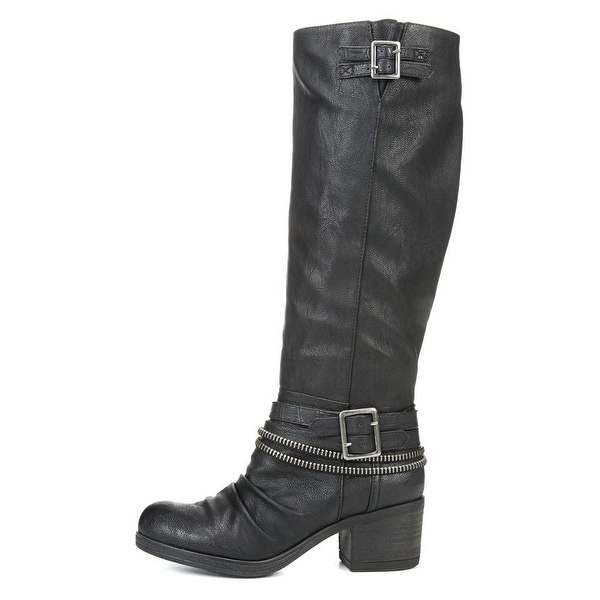 carlos santana riding boots