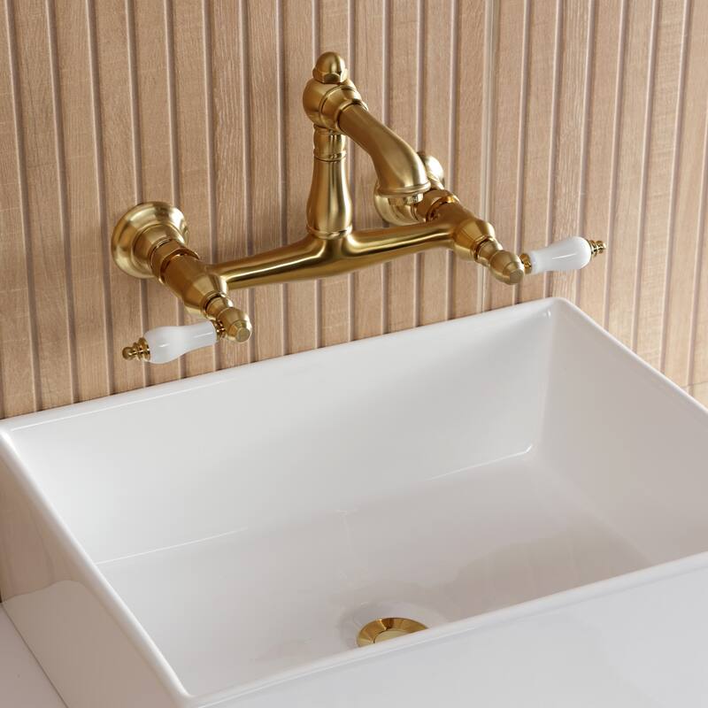 Kingston Brass English Country Two-Handle 2-Hole Wall Mount Bathroom Faucet