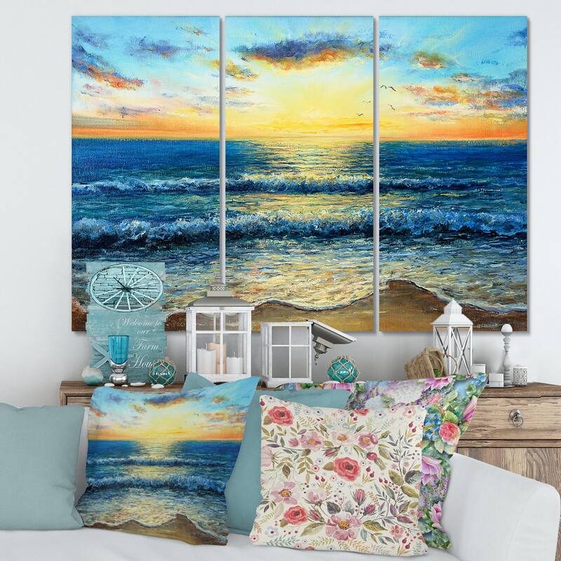 Designart "Morning Light On The Ocean Waves I" Nautical & Coastal Canvas Wall Art Print - 36 in. wide x 28 in. high - 3 Panels