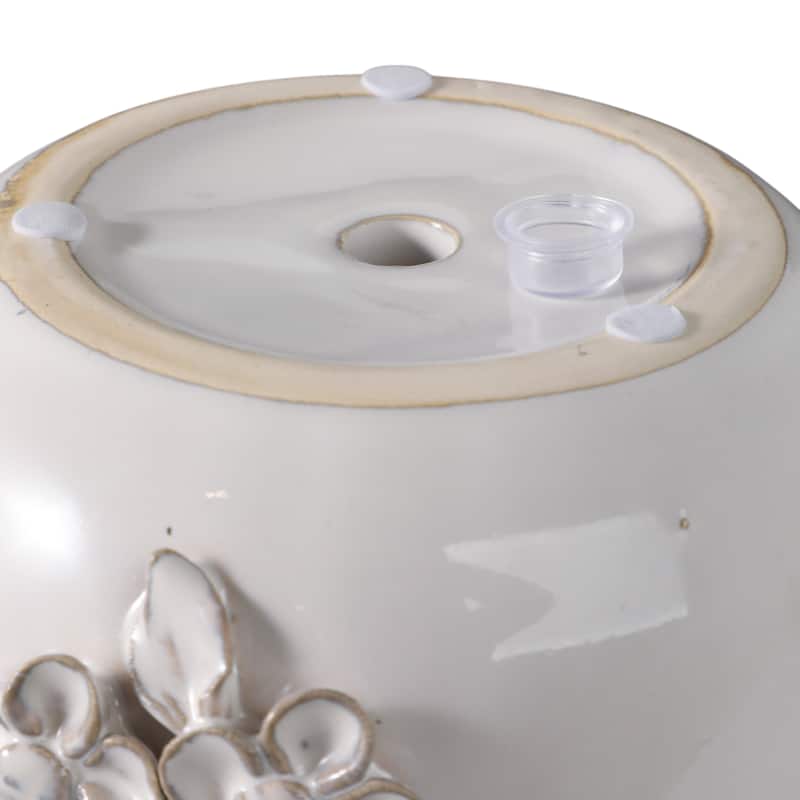 Ceramic Planter with Raised Floral Detailing and Glossy Texture